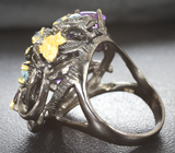 Серебряное кольцо с родолитами, аметистами, голубыми топазами и черными шпинелями Серебро 925