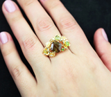Золотое кольцо с уникальным крупным андалузитом 2,95 карата, уральскими демантоидами, топазолитом и бриллиантами