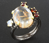 Серебряное кольцо с рутиловым кварцем, лунным камнем и мозамбикскими гранатами Серебро 925