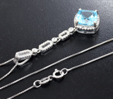 Элегантный серебряный комплект с голубыми топазами