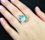 Серебряное кольцо с голубым топазом лазерной огранки 10,16 карата, аквамаринами и синими сапфирами Серебро 925