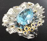 Серебряное кольцо с голубым топазом лазерной огранки 15,92 карата и синими сапфирами Серебро 925