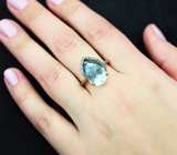 Серебряное кольцо с голубым топазом лазерной огранки 5,42 карата и синими сапфирами Серебро 925