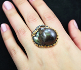 Серебряное кольцо с цветной жемчужиной барокко 40,7 карата и синими сапфирами Серебро 925