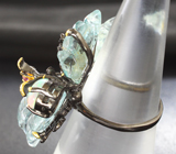 Серебряное кольцо с резными голубыми топазами и аквамарином, кристаллическим опалом, перидотами и аметистом Серебро 925
