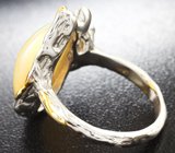 Серебряное кольцо с кристаллическим эфиопским опалом 6,78 карата, турмалинами и сапфиром