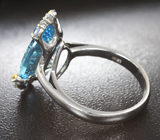 Серебряное кольцо с голубым топазом лазерной огранки 9,07 карата и синими сапфирами Серебро 925