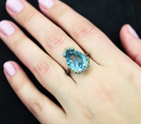 Серебряное кольцо с голубым топазом лазерной огранки 9,07 карата и синими сапфирами Серебро 925