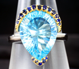 Серебряное колцьо с голубым топазом лазерной огранки 8,76 карата и синими сапфирами Серебро 925