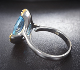 Серебряное колцьо с голубым топазом лазерной огранки 8,76 карата и синими сапфирами Серебро 925