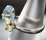 Серебряное кольцо с голубым топазом лазерной огранки 8,84 карата, аквамаринами и синими сапфирами Серебро 925