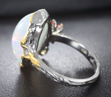 Серебряное кольцо с кристаллическим эфиопским опалом 9,49 карата и разноцветными сапфирами 