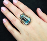 Серебряное кольцо с голубым топазом авторской огранки 19,7 карата и синими сапфирами Серебро 925