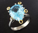 Серебряное кольцо с голубым топазом 8,37 карата и синими сапфирами