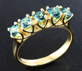 Золотое кольцо с чистейшими голубыми турмалинами 0,77 карата Золото