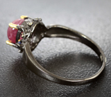 Серебряное кольцо cо звездчатым рубином и синими сапфирами Серебро 925