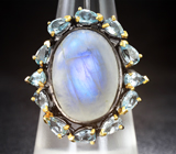 Серебряное кольцо с лунным камнем и голубыми топазами Серебро 925