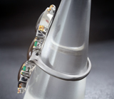 Серебряное кольцо с аммолитом аммонита, изумрудами и сапфирами Серебро 925