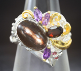 Серебряное кольцо с черным солнечным камнем с эффектом кошачьего глаза, аметистами и гранатами Серебро 925