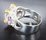 Серебряное кольцо с бесцветным кварцем и аметистами Серебро 925