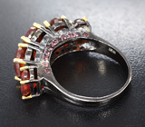 Серебряное кольцо с ограненными эфиопскими опалами и родолитами
