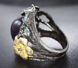 Серебряное кольцо с аметистами и голубыми топазами