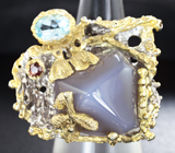 Серебряное кольцо с халцедоном, голубыми топазами и гранатами Серебро 925