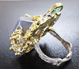 Серебряное кольцо с халцедоном, голубыми топазами и гранатами Серебро 925