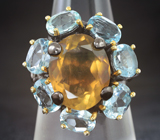 Серебряное кольцо с золотисто-желтым флюоритом и голубыми топазами Серебро 925