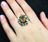 Серебряное кольцо с золотисто-желтым флюоритом и голубыми топазами Серебро 925