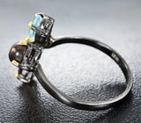 Серебряное кольцо с кристаллическим черным опалом, голубым топазом, перидотом и родолитом Серебро 925