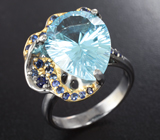 Серебряное кольцо с голубым топазом лазерной огранки 9,51 карата и синими сапфирами Серебро 925