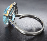 Серебряное кольцо с голубым топазом лазерной огранки 9,51 карата и синими сапфирами