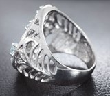 Ажурное серебряное кольцо с голубыми топазами