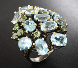 Серебряное кольцо с голубыми топазами и перидотами Серебро 925