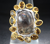 Серебряное кольцо с кабошоном турмалина 16,48 карата и золотистыми турмалинами