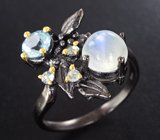 Серебряное кольцо c лунным камнем и голубыми топазами
