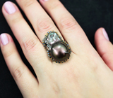 Серебряное кольцо с жемчужиной барокко 39,1 карата и синими сапфирами