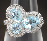 Чудесное серебряное кольцо с голубыми топазами Серебро 925
