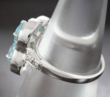 Чудесное серебряное кольцо с голубыми топазами Серебро 925