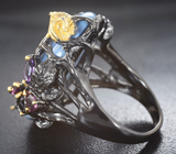 Серебряное кольцо с голубым опалом, аметистом и родолитами Серебро 925