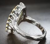 Серебряное кольцо с кристаллическим эфиопским опалом 3,84 карата и гранатами Серебро 925