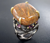 Серебряное кольцо с рутиловым кварцем и родолитами