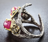 Серебряное кольцо с рубинами и гранатами
