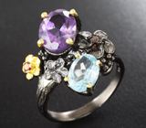 Серебряное кольцо с аметистом, голубым топазом и родолитами