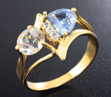 Золотое кольцо c морганитом 0,87 карата, голубым сапфиром 1,07 карата и бесцветными цирконами