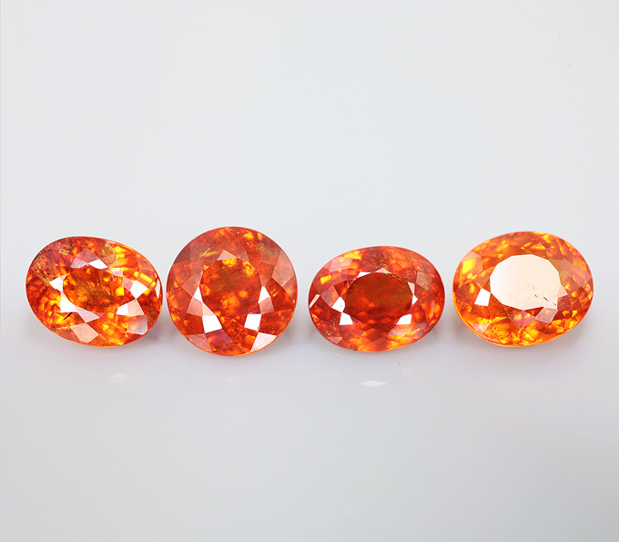 Набор из 4 спессартинов «фанта» 8,85 карата