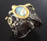 Серебряное кольцо с кристаллическим эфиопским опалом и желтым турмалином