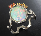 Серебряное кольцо с  кристаллическим эфиопским опалом авторской огранки 1,5 карата, оранжевым и золотистыми сапфирами Серебро 925