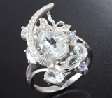 Эффектное серебряное кольцо с аквамаринами и танзанитами Серебро 925
